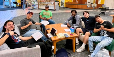 group of student sitting at a lounge area